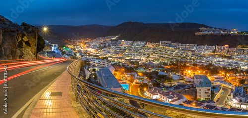 View of Puerto Rico from elevated position at dusk, Playa de Puerto Rico, Gran Canaria, Canary Islands photo