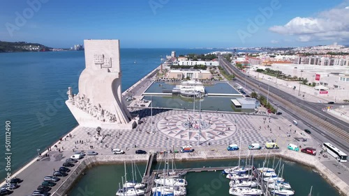 Lisbon, Portugal, April 24, 2022: DRONE AERIAL FOOTAGE: The Padrao dos Descobrimentos (Monument to the Discoveries) is a monument on the bank of the Tagus River in Lisbon, Portugal. photo