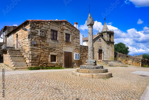Stone pillory and Main Church, Idanha-a-Velha village, Serra da Estrela, Beira Alta, Portugal photo