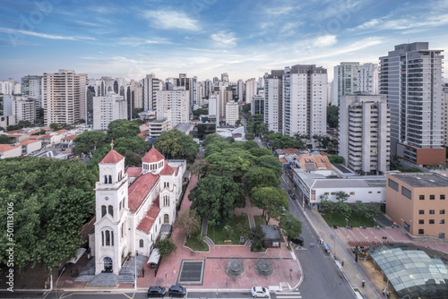 Moema neighborhood, Catholic church of Nossa Senhora Aparecida and upmarket residential apartments, Sao Paulo photo