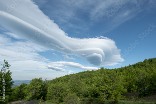 Long lenticular clouds in a mountain landscape, Emilia Romagna
