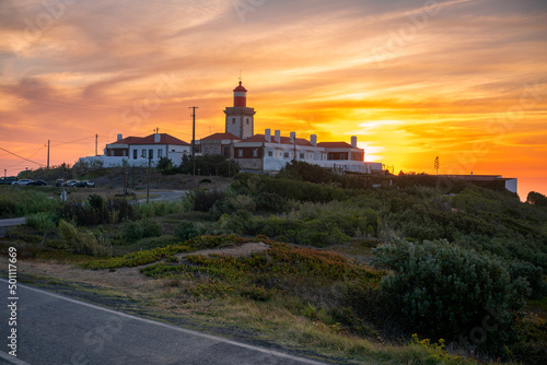 Roca Cape (Cabo da Roca) Lighthouse, westernmost point of Europe, at sunset, Portugal photo