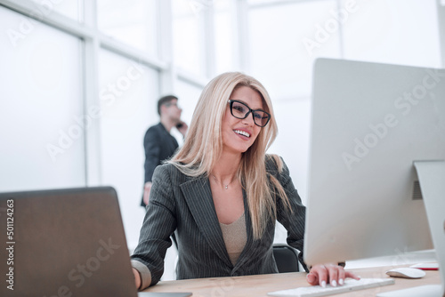 smiling businesswoman working in a modern office