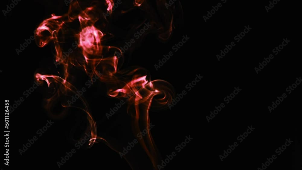 Realistic cloud smoke with streamline pattern. Abstract red smoke on dark background in slow motion. Realistic cloud smoke with streamline pattern. Abstract red smoke on dark background in slow motion.