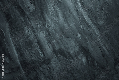 Dark worn surface background with grunge rough peeled texture