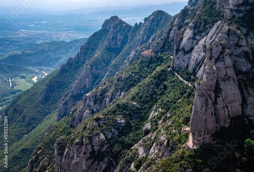Montserrat is a mountain near Barcelona, in Catalonia. View of the chapel of Santa Cova photo