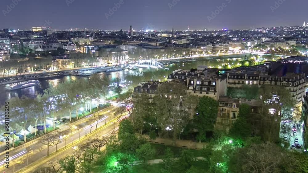 Aerial view of river Seine from the Eiffel tower night timelapse. Paris, France, Europe. Aerial view of river Seine from the Eiffel tower night timelapse. Paris, France, Europe.