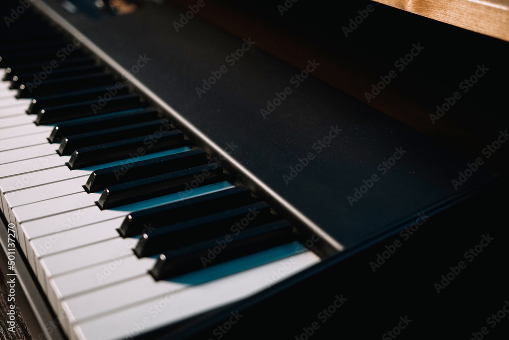 Naklejka premium Piano keys close-up