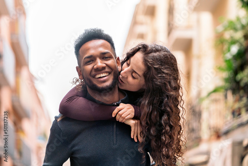 Young Multiethnic Couple doing piggyback