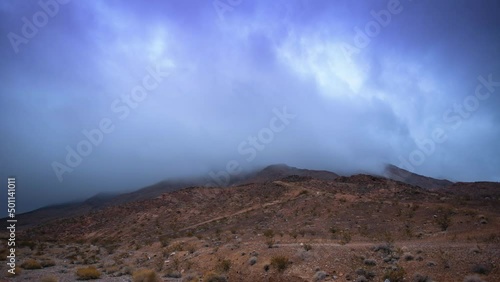 Lockdown Time Lapse Shot Of Dramatic Clouds Moving On Semi Arid Mountain In Desert - Las Vegas, Nevada