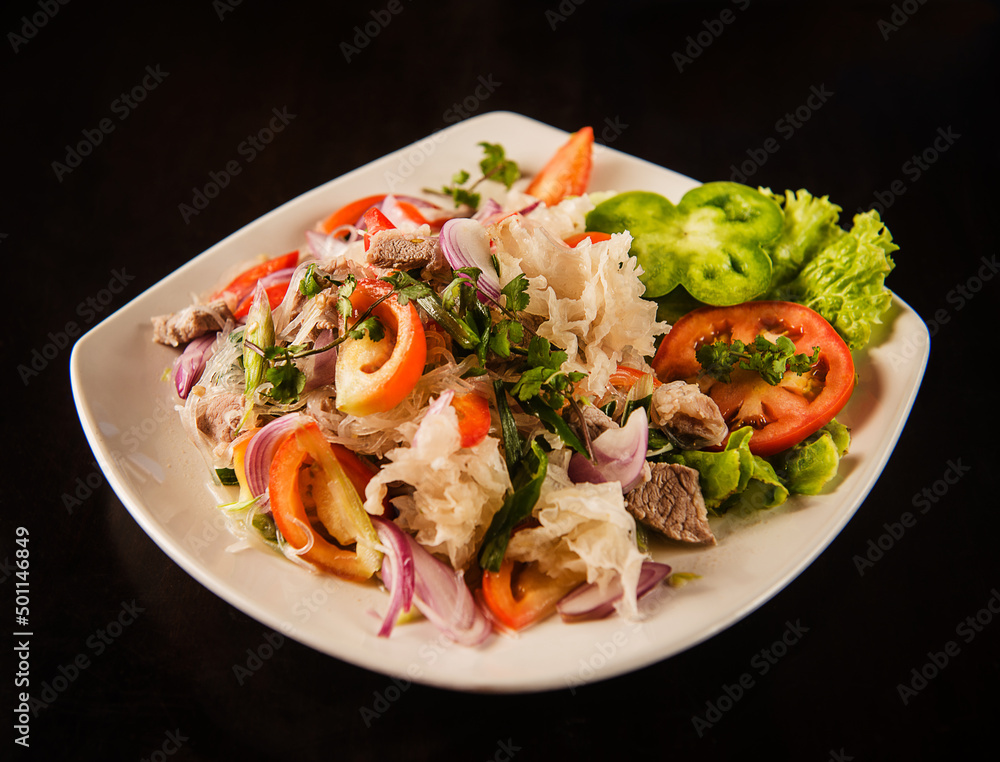 Thai Rice noodles with beef and vegetables . Thai Rice noodles with beef and vegetables .