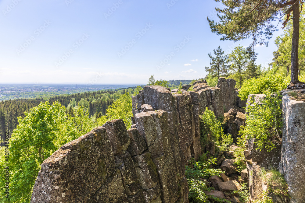 Rock crevice on a mountain with a landscape view