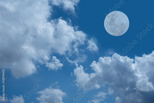 Full moon on the blue sky with cloud.