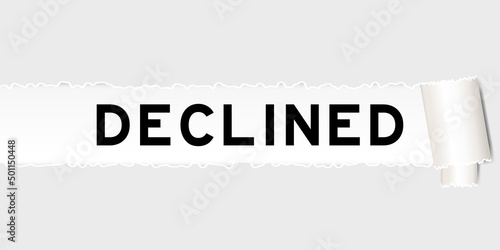 Ripped gray paper background that have word declined under torn part