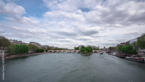 Banks of the river Siene with le de la Cite timelapse, Paris. photo