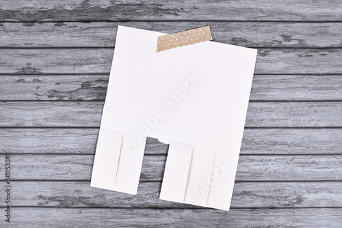 Εκτύπωση καμβά Empty white tear-off stub paper note without text on wooden wall