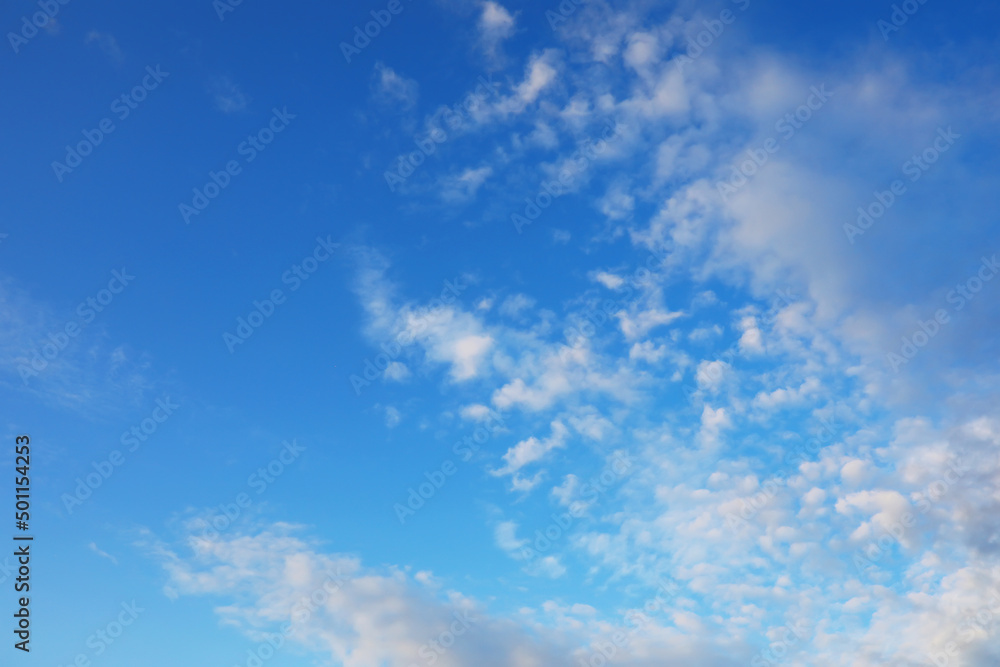 High clouds in the summer sky. Sky background. Meteorological observations of the sky.