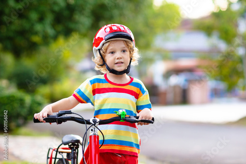 Kids on bike. Child on bicycle. Kid cycling.