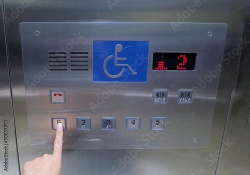 The elevator button with braille code of the elevator. Universal design. Soft focus. Technology, sign and symbol concept.