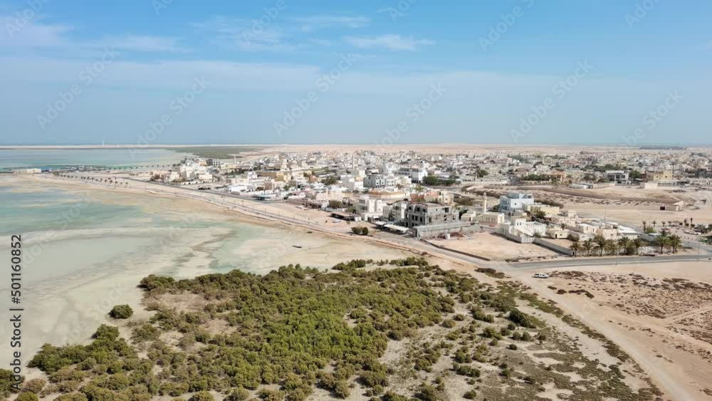 Al Khor, Qatar: Aerial view of coastal resort city Al Khor (Al Khawr) - landscape panorama of Arabian Peninsula from above, West Asia Al Khor, Qatar: Aerial view of coastal resort city Al Khor (Al Khawr) - landscape panorama of Arabian Peninsula from above, West Asia