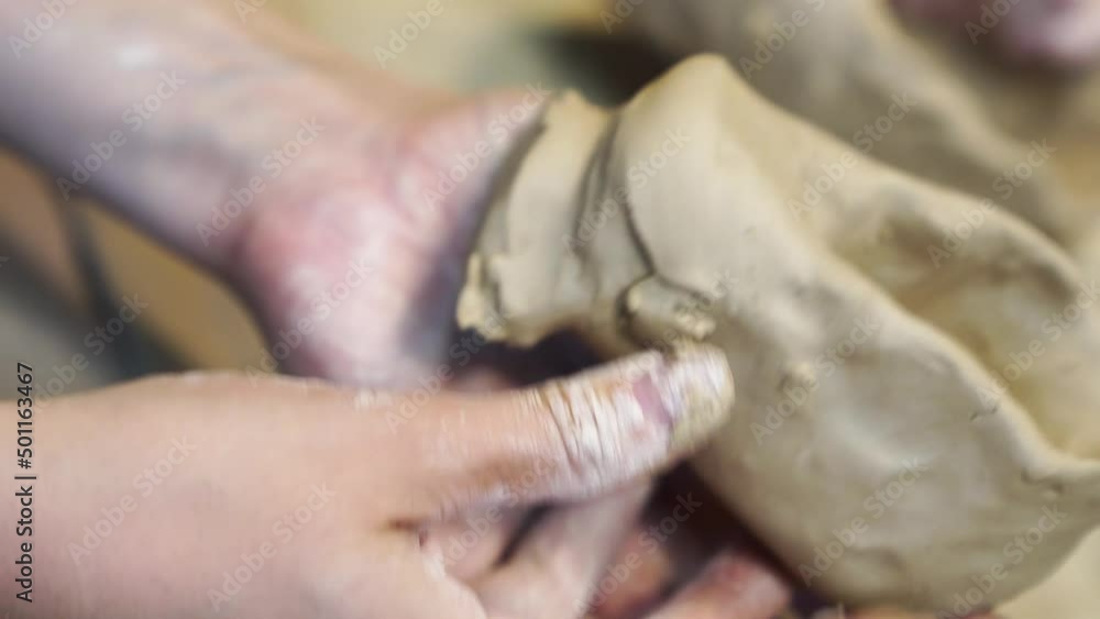 hands sculpt a figurine or sculpture of clay. developmental and creative activities with children. pottery workshop. a hobby for the whole family. hands sculpt a figurine or sculpture of clay. developmental and creative activities with children. pottery workshop. a hobby for the whole family.