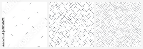 Neutral seamless pattern set with chaotic diagonal scribble lines. Black and white abstract scattered strokes vector design.