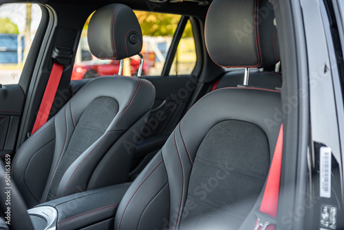 a car seat of a modern car with red accent © Dubrafoto