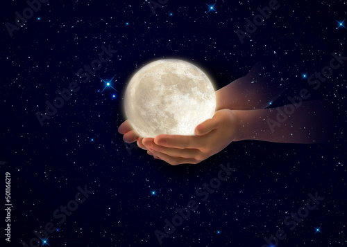 moon in hands on front blue cloudy sky hold peace concept natire background 