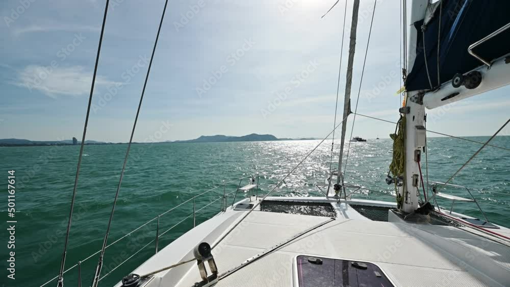 Luxury yacht sailing in tropical sea on windy and monsoon day Luxury yacht sailing in tropical sea on windy and monsoon day