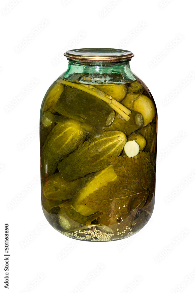 A jar of pickles on a white background.Home-made pickled cucumbers. A jar of pickles on a white background.Home-made pickled cucumbers.
