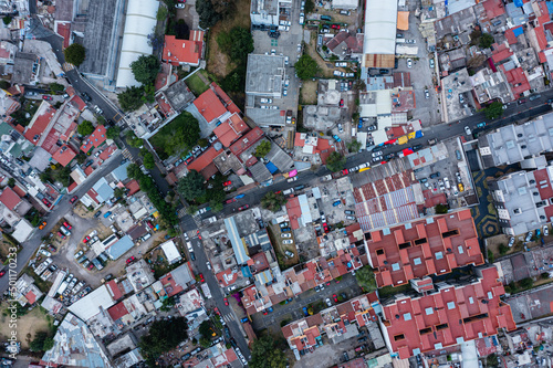aerial view of houses in Cuajimalpa de Morelos at sunset in the metropolitan area on the outskirts of Mexico City photo