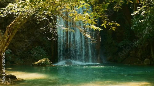 Beautiful waterfall and emerald pool in tropical rain forest in Thailand..
