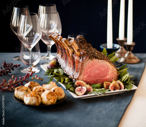 Aged Frenched prime rib roast with garlic and figs  photo