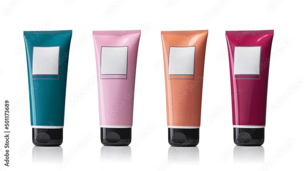 Four plastic tubes with cosmetic product or acrylic paint isolated on white background Four plastic tubes with cosmetic product or acrylic paint isolated on white background