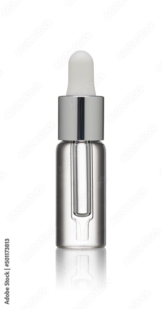 Glass bottle with dispenser filled with serum isolated on a white background Glass bottle with dispenser filled with serum isolated on a white background