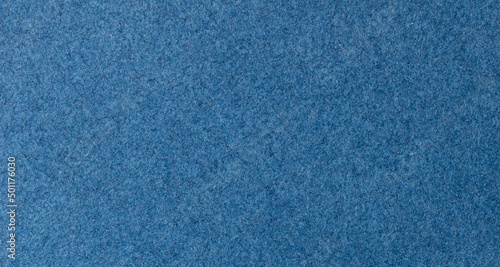 a blue sheet of paper with a visible texture