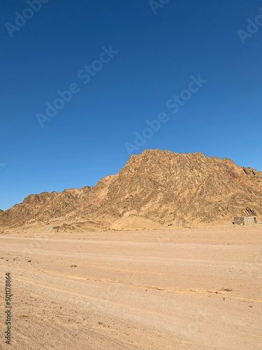 Beautiful small canyon with red sandstone rocks and sand, Nabq protected area, Sharm El Sheikh, Sinai peninsula, Egypt, North Africa. Egyptian safari 