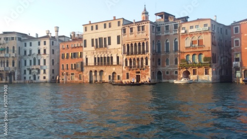 Views of the most beautiful canal of Venice - Grand Canal water streets, boats, gondolas, mansions along. Italy. © Susana