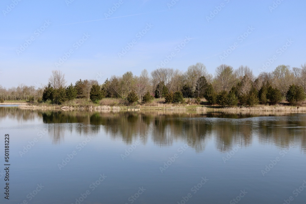 The peaceful country lake on a sunny day.