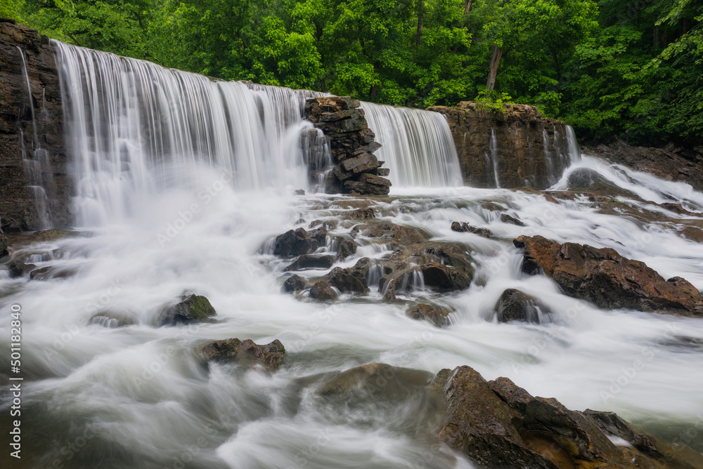 Fototapeta premium Cascading water over old mill site in Tennessee