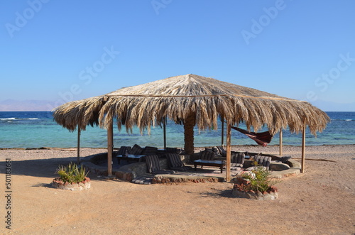 A straw canopy on the seashore. Sinai peninsula, Egypt.