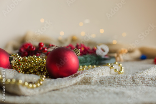 New Year's toys on the background of a luminous garland © si.verik
