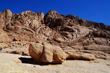 A huge stone in the background of mountains. The Sinai peninsula, Egypt.
