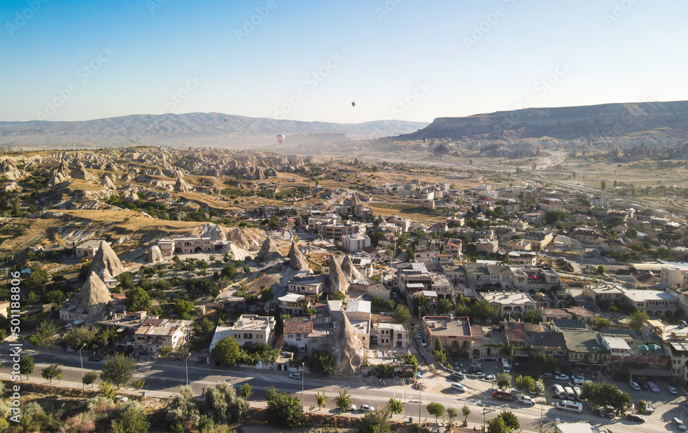Aerial photos of the city of Goreme in Cappadocia, Turkey, with a sunny day and clear of clouds, mountain and rocks formation