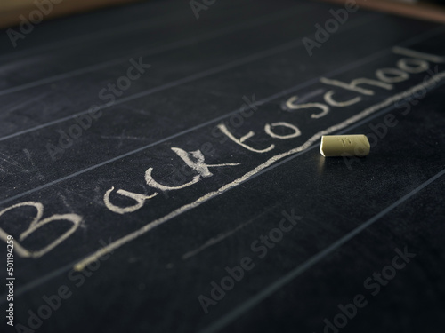 Blackboard with back to school in chalk writing