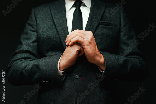 Enthusiastic confident businessman posing