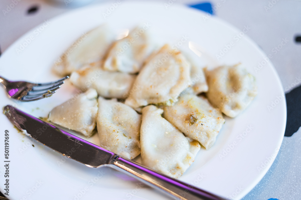 Polish dumplings on a plate, polskie pierogi na talerzu Polish dumplings on a plate, polskie pierogi na talerzu