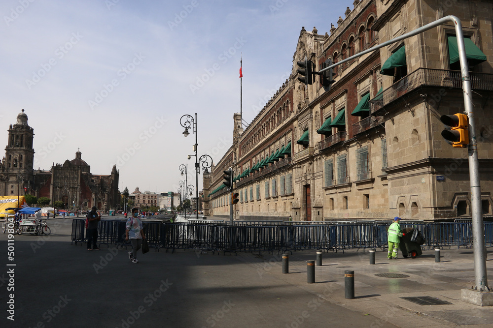 Mexico City, Mexico – June 08, 2021: The outside of Palacio Nacional that houses the president Lopez Obrador is surrounded by metal walls