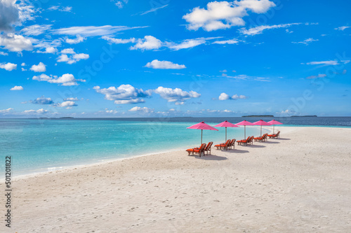 Amazing tranquil sea sand sky. Recreational summer travel tourism. Aerial landscape view with chairs and umbrellas on paradise island beach, seaside. Resort vacation, exotic nature. Beautiful tropics