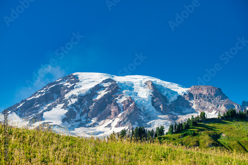 Mount Rainier with snowy peak on a beautiful sunny day, Washington, USA.